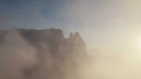 drone shot of the sunset above the clouds
