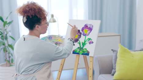 Creative,-art-and-woman-painting-in-her-living