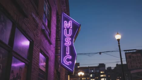music venue at night with neon sign