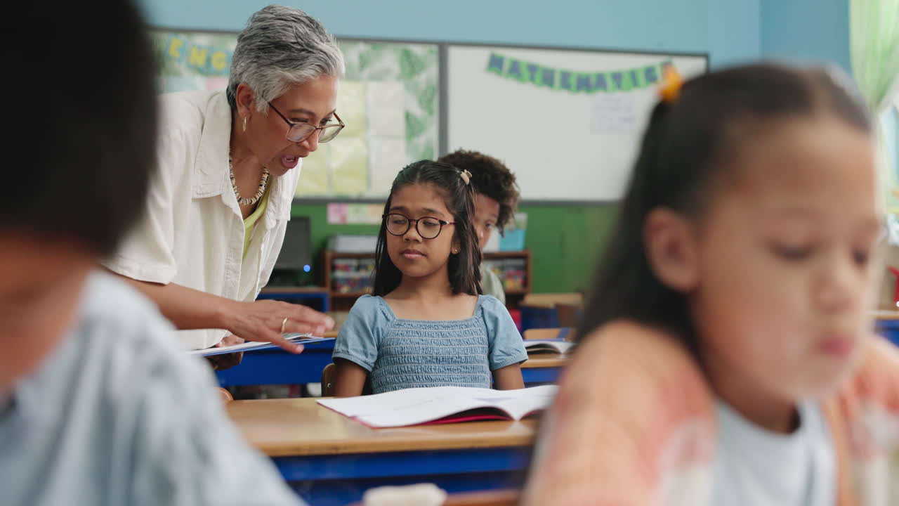 Teacher assisting a student in the classroom