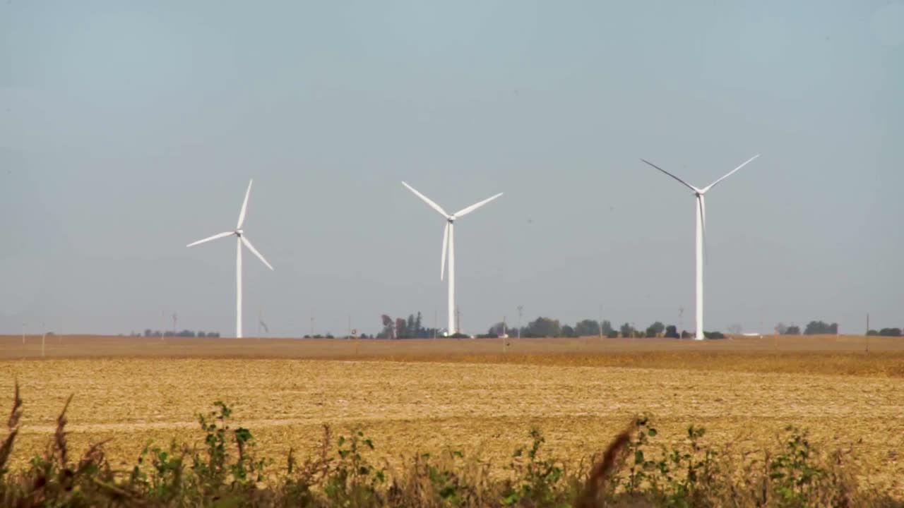 Energy Conservation Concept - Wind Turbines Generating Electricity