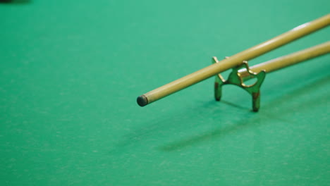playing billiard game. white pool balls close-up on green billiards table for start to play. russian game, russian pyramid. billiard balls with numbers on a pool table. billiards team sport.high quality 4k footage