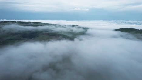 aerial shot overhead low-lying clouds in the tatras mountains, slovakia