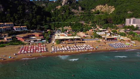 cinematic orbiting drone view of glyfada beach in corfu island in greece