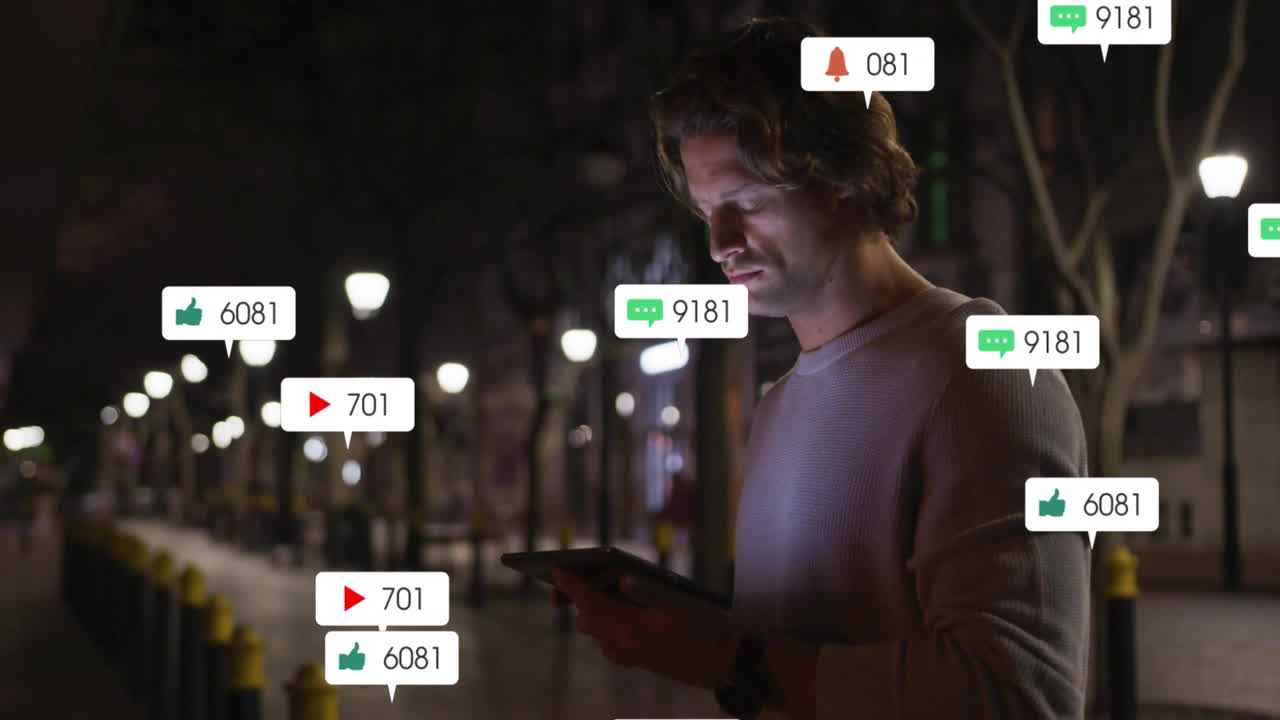Notifications and social media interactions animation over man using tablet at night