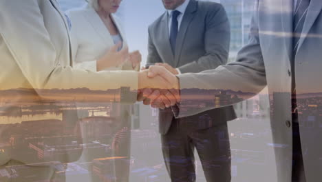 digital composition of caucasian businessman and businesswoman shaking hands against cityscape