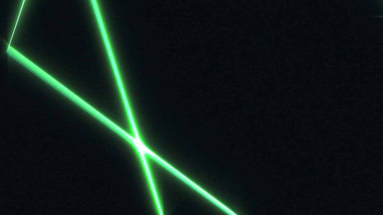 Green laser beams in geometric patterns