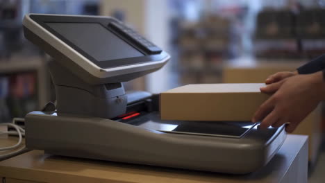 weighing a package on a digital scale