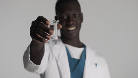 African-american-doctor-on-grey-background.