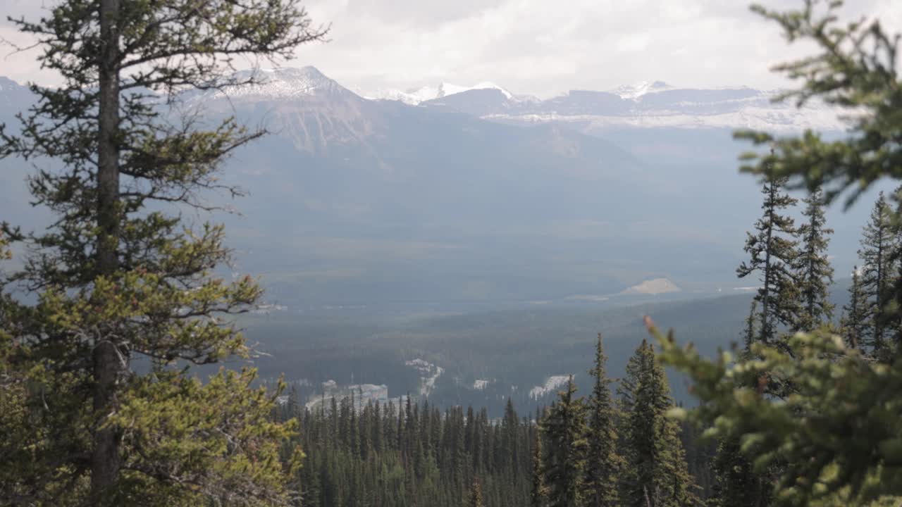 Looking down on Fairmont Lake Louise from the top of the hiking trail at Lake Agnes Tea House on Mount St. Piran and Mount Whyte, within Banff National Park near Lake Louise Alberta.
