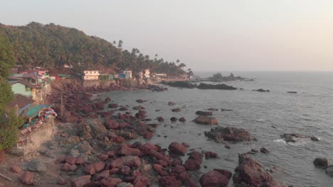 fly over rocks at arambol beach, goa, india