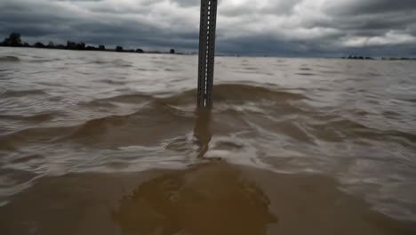 flooded river with marker