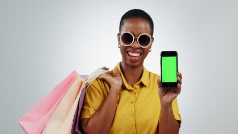 Woman,-phone-and-online-shopping-in-studio