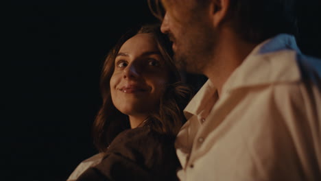a couple sharing an intimate moment in the dark