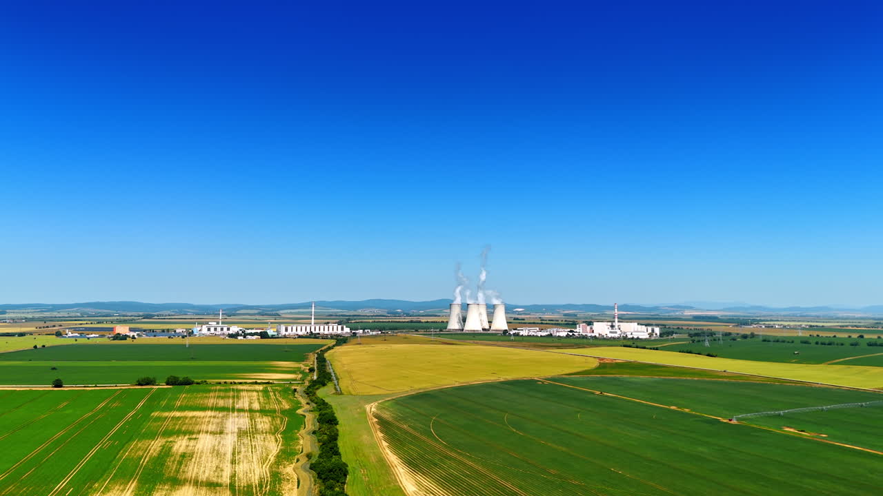 Large territory of the modern industrial plant located away from the cities. Factory in the countryside of Slovakia. Aerial view