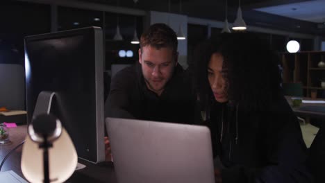 young office executives working over computer in a modern office