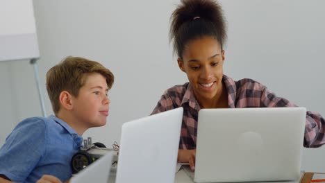 kids using laptop in training institute 4k