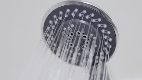 Close-up-of-water-drops-in-the-shower-head.