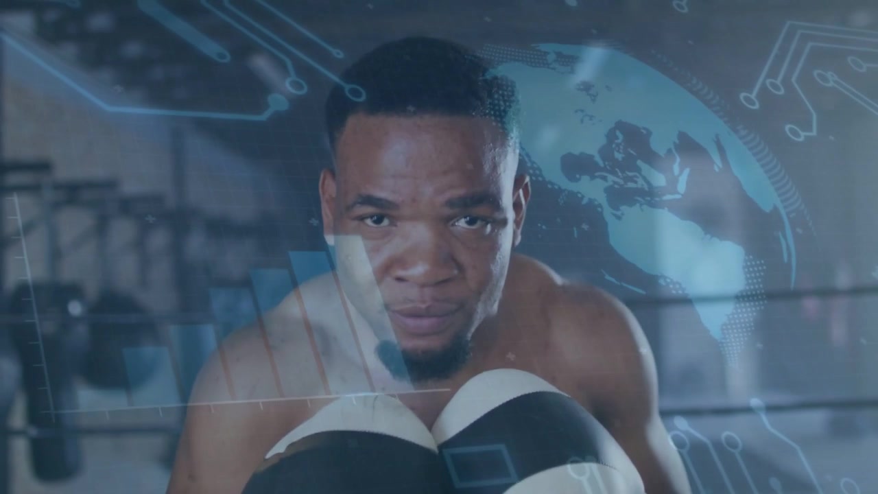 Male boxer thrusting gloves at camera, throwing jabs in ring while blue globe highlighting training