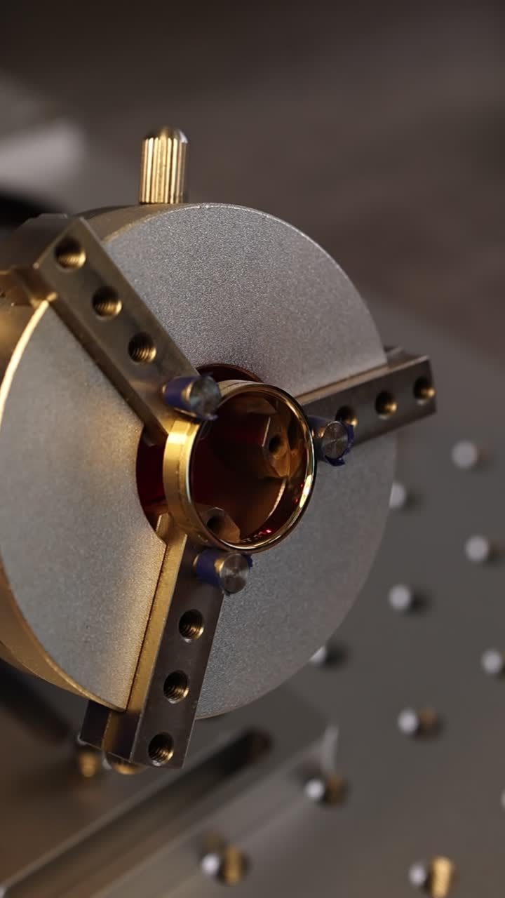 Close-up of Laser Engraving Machine Marking a Gold Ring