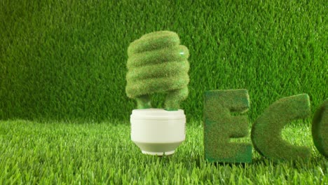 Eco-light-bulb-in-green-grass.-Eco-concept-background