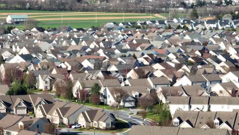 An-aerial-establishment-shot-of-a-residential-area-with-lots-of-houses-in-the-USA