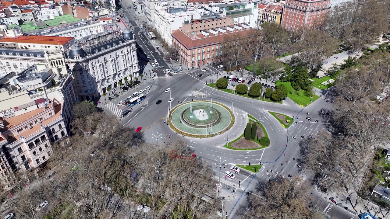 Neptuno Fountain At Madrid Spain. Famous Roundabout. Downtown Cityscape. Cultural Heritage Skyline. Neptuno Fountain In Spain. Madrid Street Scene.