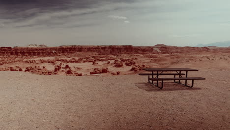 empty picnic table in a desert landscape