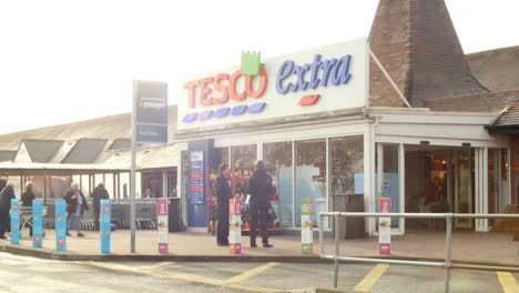 Exterior-View-Of-Tesco-Supermarket-Entrance