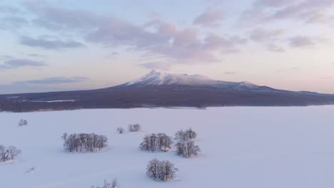 Slow-sideways-flight-over-frozen-islands-and-Mt