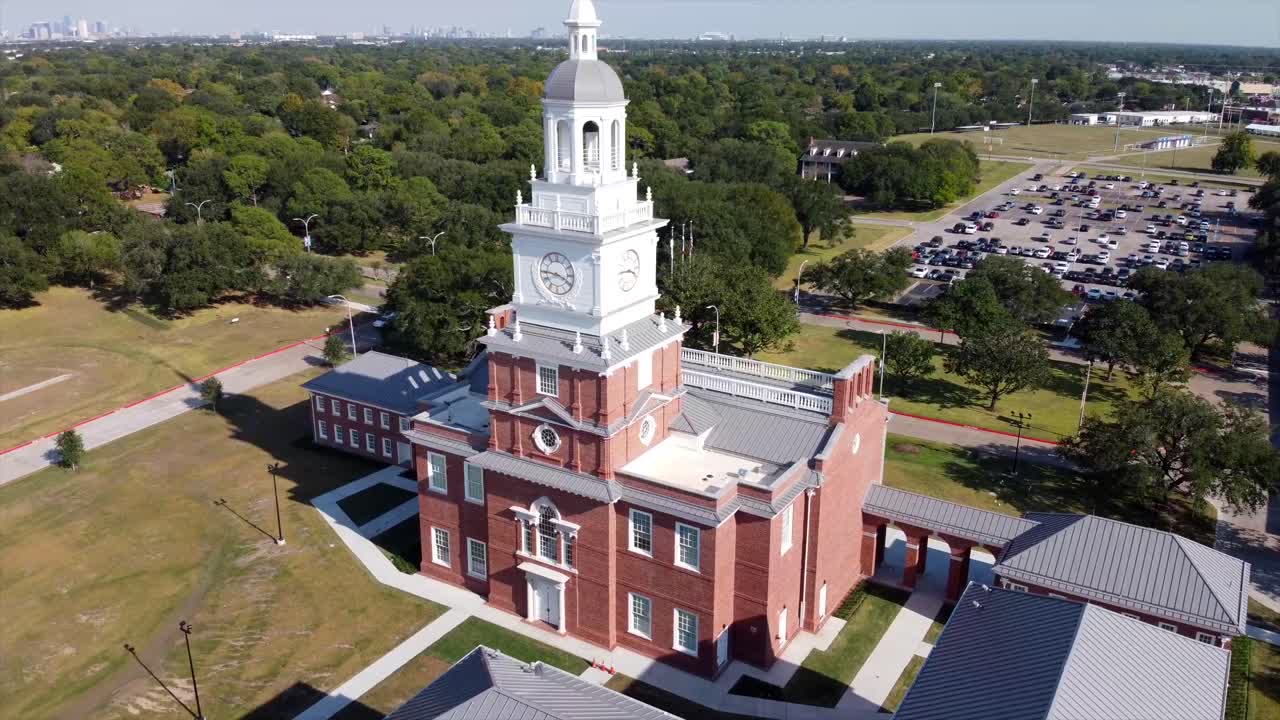 A drone shot of a college clock tower