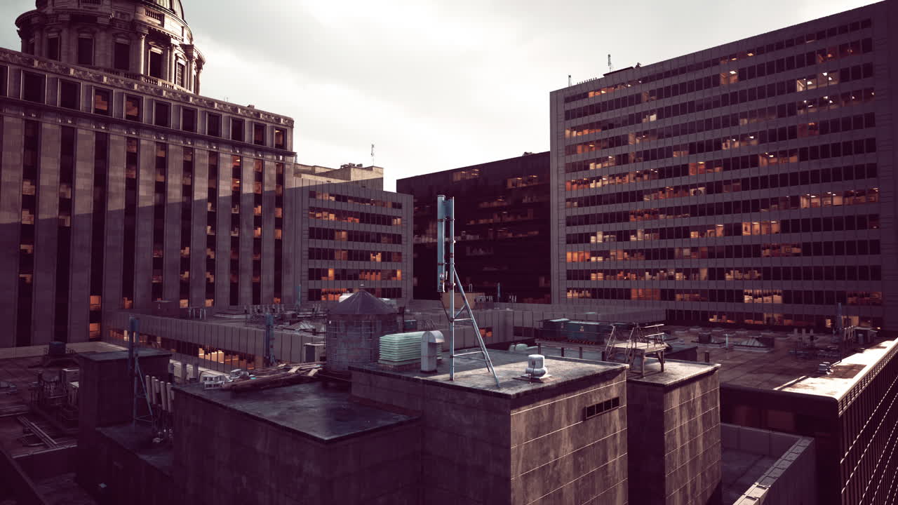 A view of a city with tall buildings and a clock tower