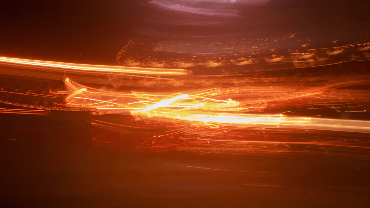 Displaying orange light streaks and central cluster moving in dark scene, from camera motion