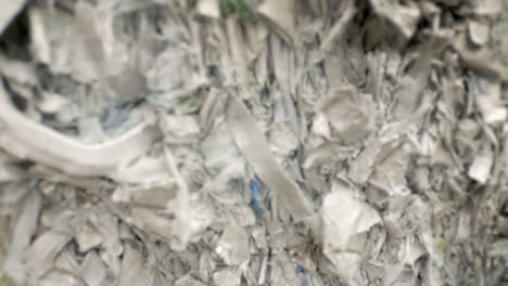 a pile of recycled paper from tetrapak vases