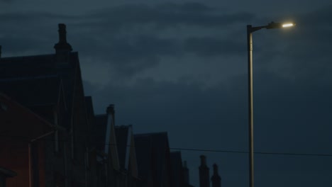 Lamp-Street-On-Peaceful-Neighbourhood-At-Dusk-In-Seaside-Town