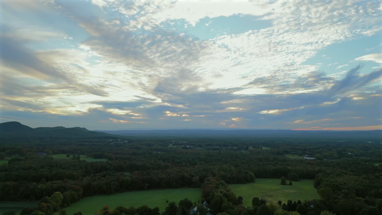 Stunning Aerial View of Sunset Over Rural Landscape