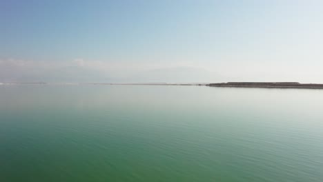 4K-Aerial-drone-dolly-up-from-sea---Dead-sea-hotel-zone