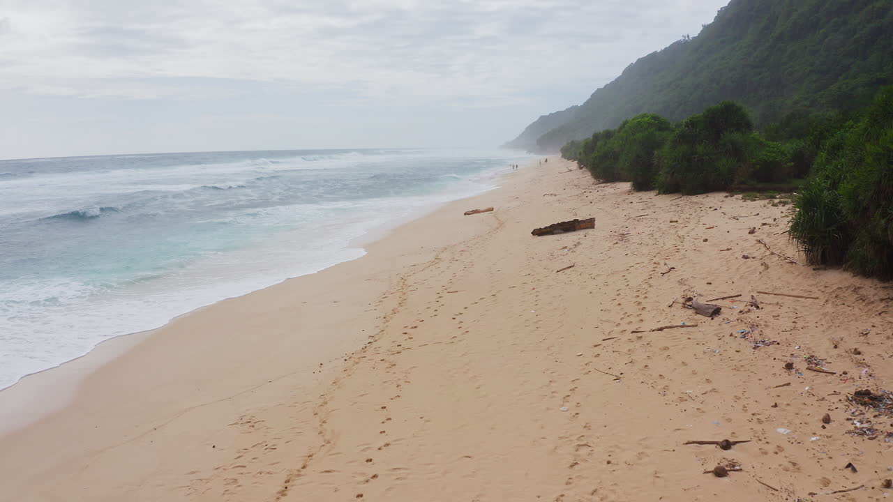 Aerial Fly Over of Beach in Uluwatu Bali Indonesia. 4K Drone