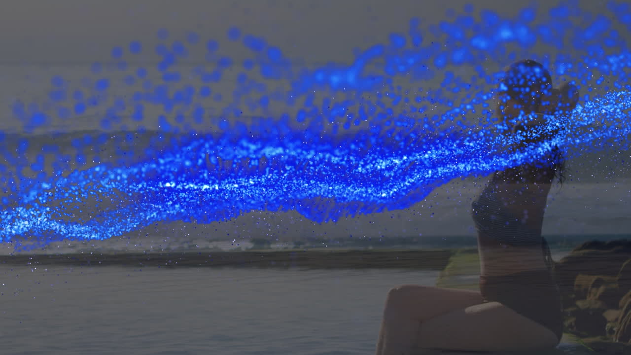 해변에서 백인 여성 위에 파란 반점의 애니메이션