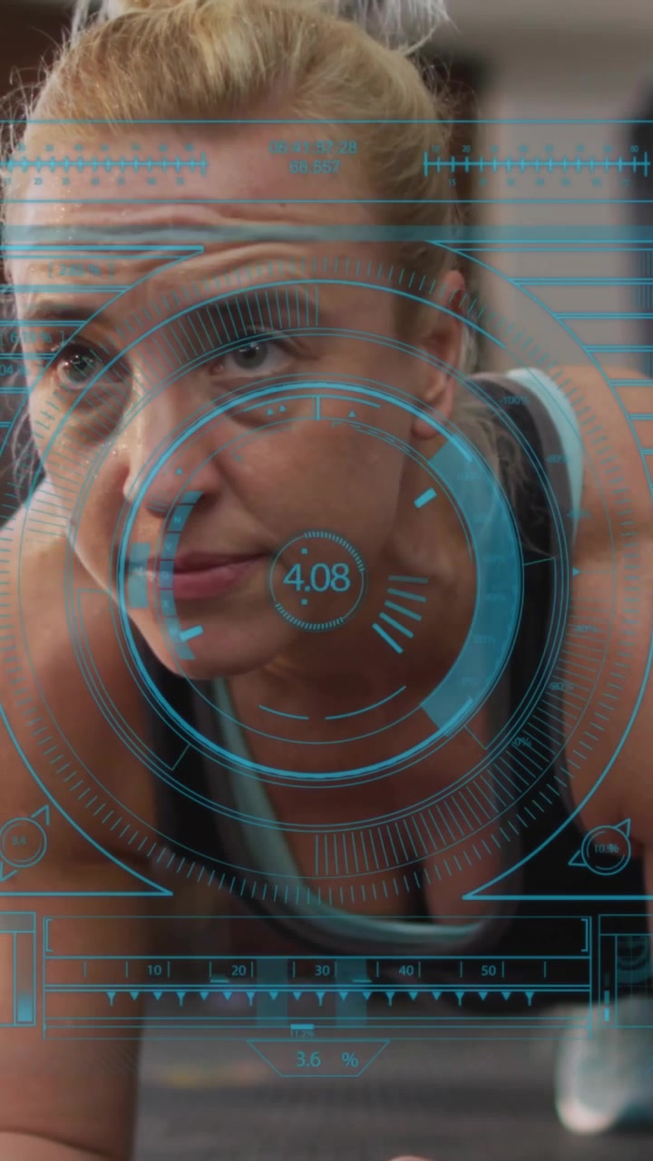 Vertical video: Woman holding forearm plank, timer starting while blue HUD tracking fitness metrics