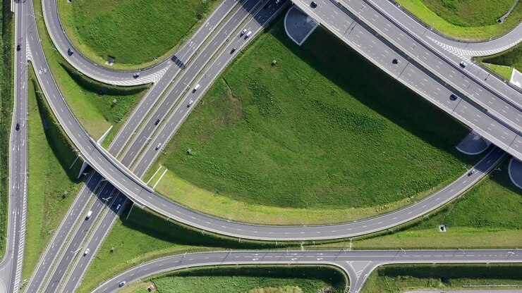 Multilevel road, road junction, intersection of traffic flows. Aerial view.