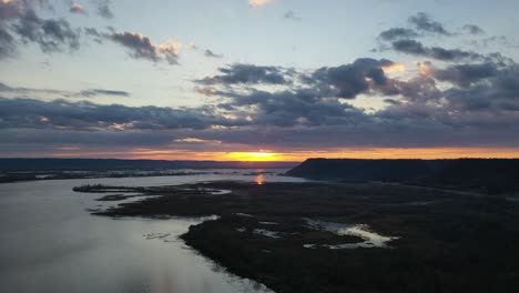 sunset over a river and marsh