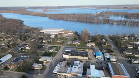 The-Illinois-River-at-flood-stage-in-Central-Illinois,-downtown-riverfront-Chillicothe,-near-Peoria,-Illinois