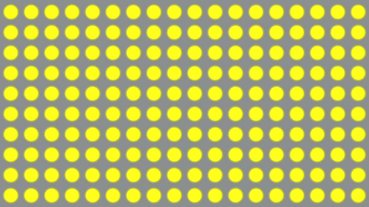 黄色いライトが絶対灰色の背景でオンとオフになる壁