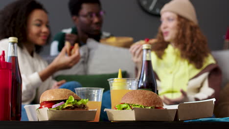 three friends eating at home