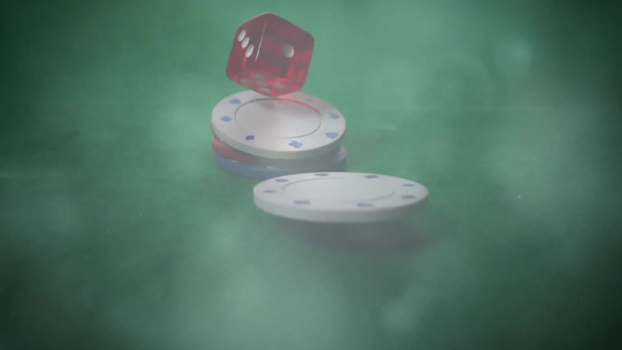 Tokens and dice falling on casino table