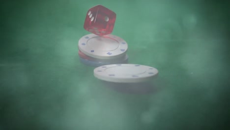 tokens and dice falling on casino table