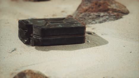 old rusty fuel canister in the desert