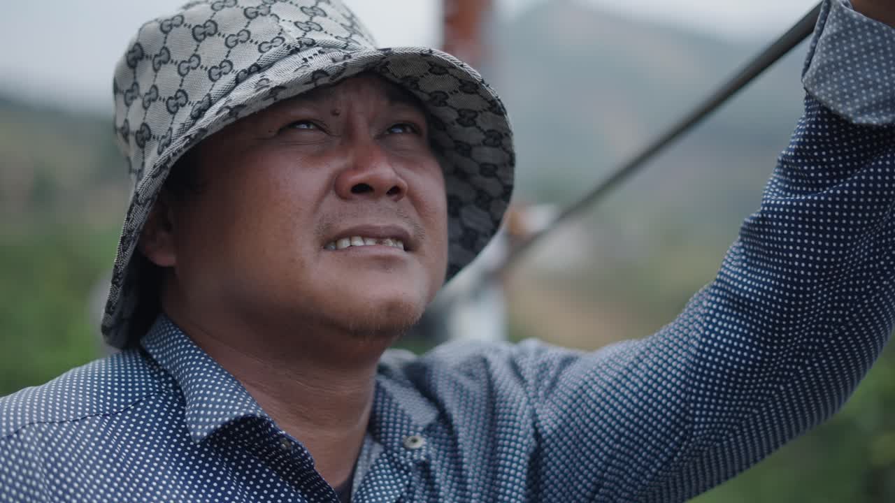 Man in a Gucci Hat Smoking