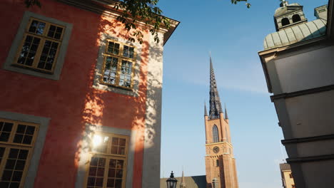 view of the famous church with an iron spire in stockholm steadicam shot